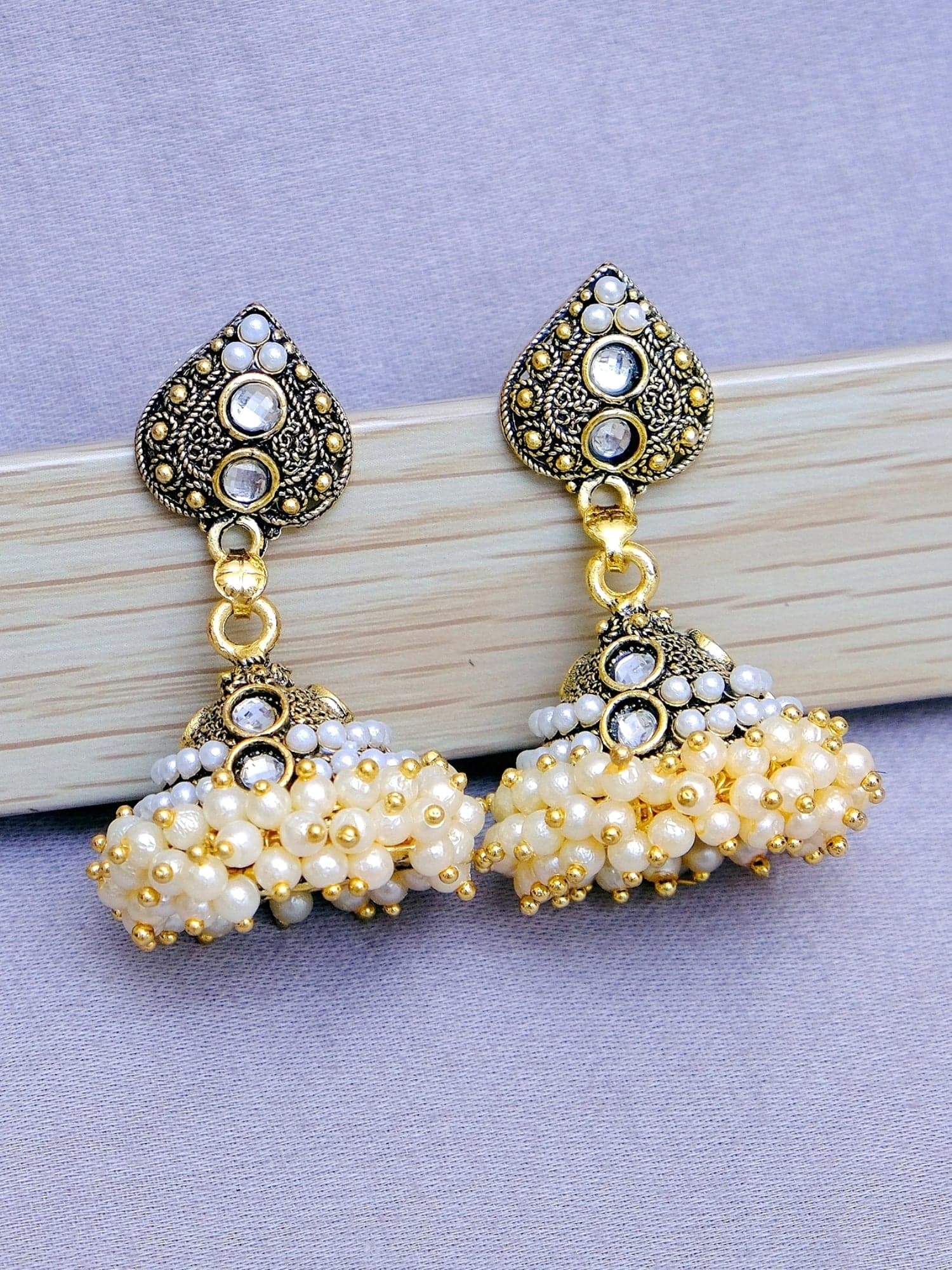 Minty Rains: Oxidized Silver Drop Earrings with Elegant Elephant Motifs