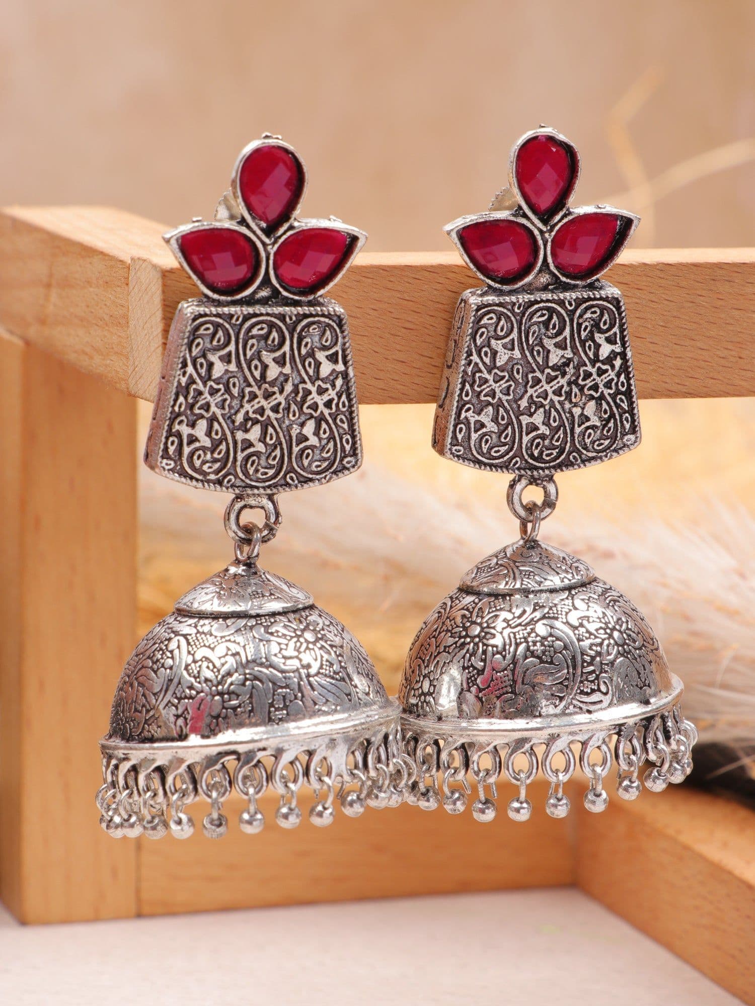 Red Radiance: Oxidised Silver Jhumka Earrings in Beguiling Red