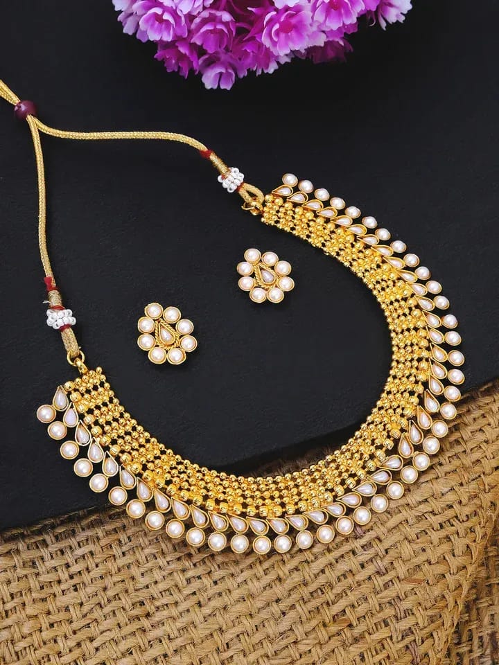 Chic Pearl Ensemble: Bridal Necklace and Earring Set for the Modern Woman