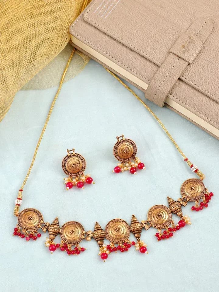 Dazzle in Magenta: Antique Gold-Plated Pink Necklace Set